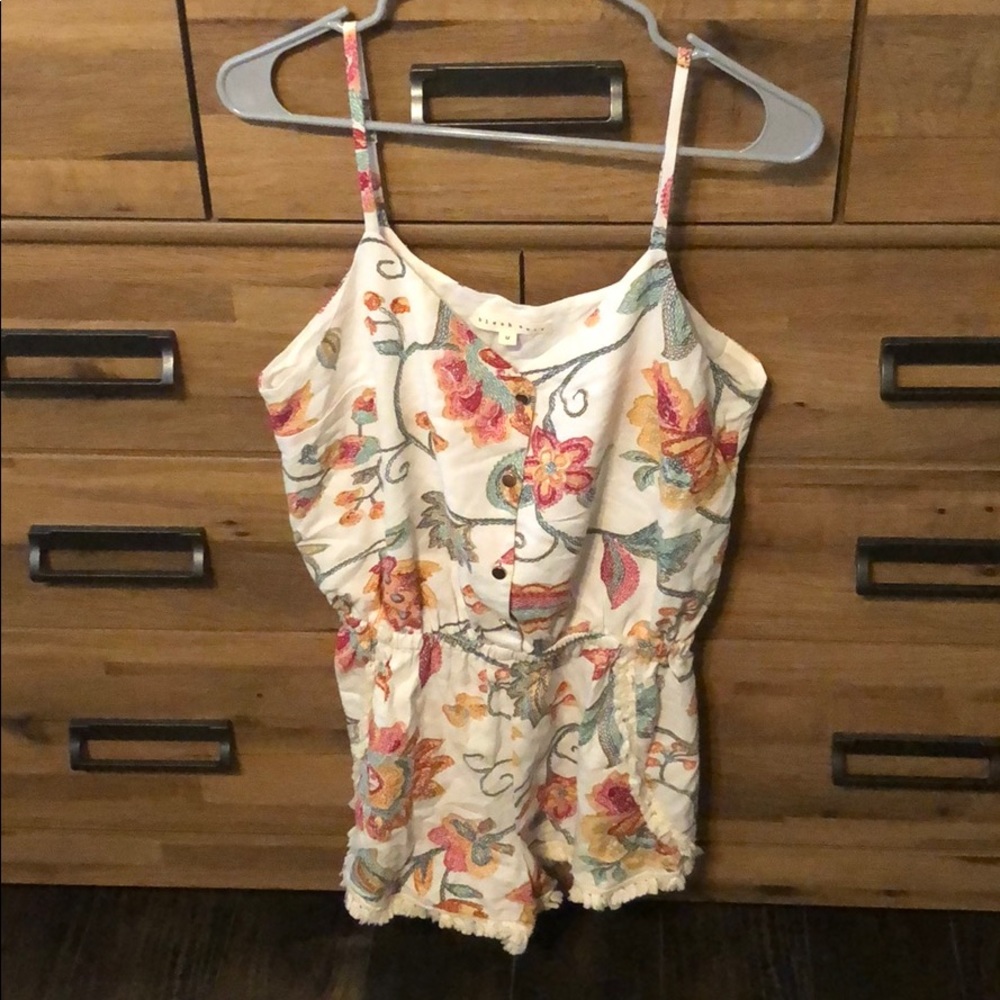 Gold button front romper with frayed bottom
